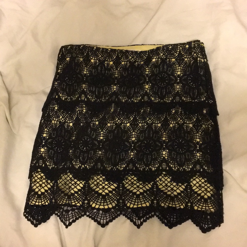 Black and pale yellow lace skirt